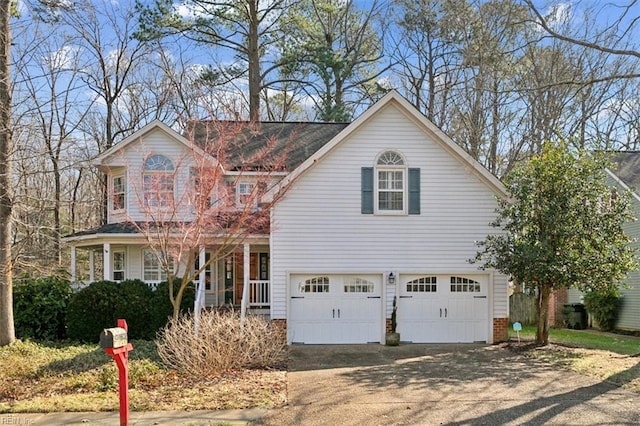 view of front of property with a garage