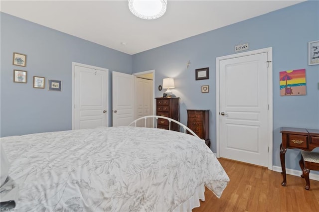 bedroom featuring light hardwood / wood-style flooring