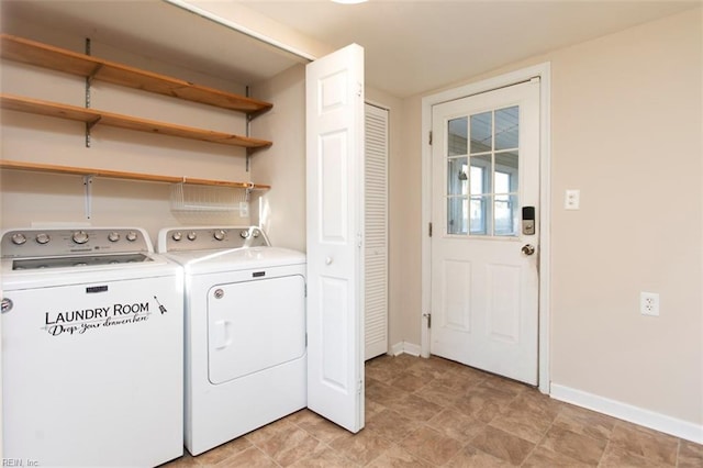 washroom with independent washer and dryer