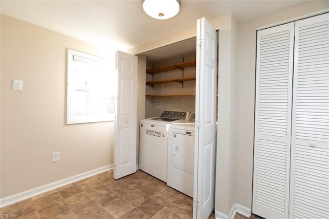 laundry area with independent washer and dryer