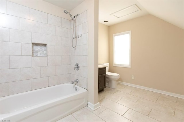 full bathroom with lofted ceiling, tiled shower / bath combo, vanity, tile patterned flooring, and toilet