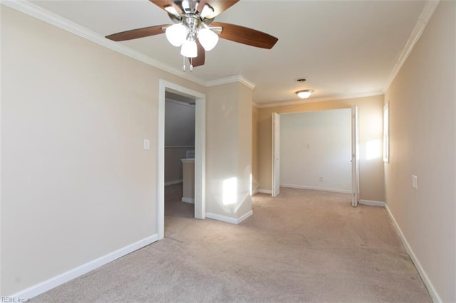 carpeted spare room featuring ornamental molding