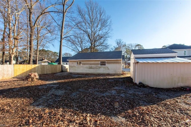 exterior space featuring a shed