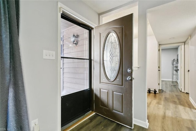 foyer with hardwood / wood-style floors