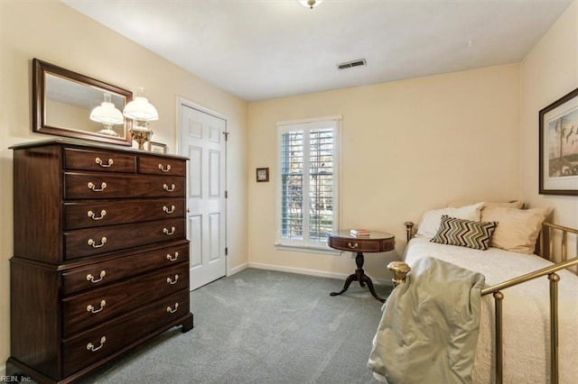 bedroom with light colored carpet