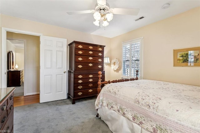 carpeted bedroom with ceiling fan