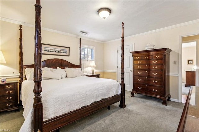 bedroom with crown molding and carpet