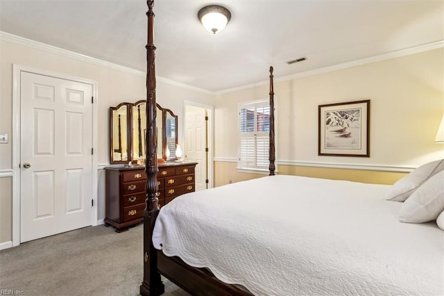 carpeted bedroom featuring ornamental molding