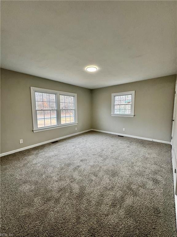 view of carpeted spare room