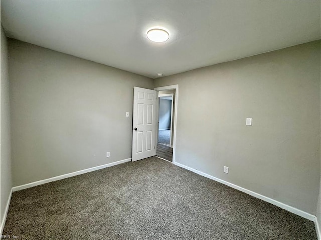 empty room with carpet flooring