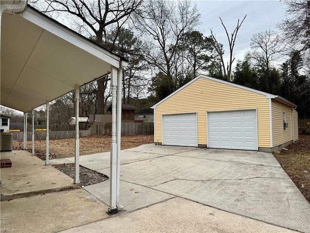 garage featuring a carport