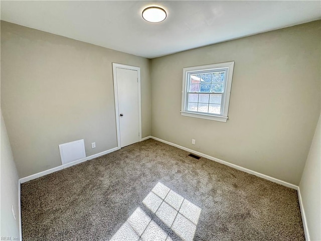 view of carpeted spare room