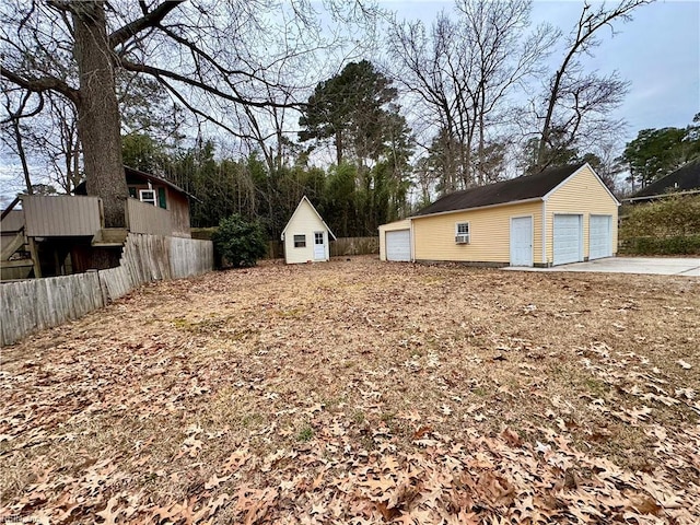 view of yard with a shed and a garage