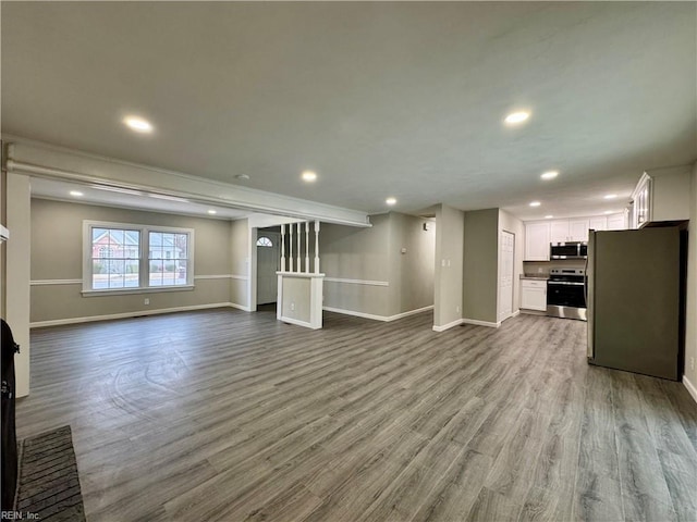 unfurnished living room featuring light hardwood / wood-style flooring