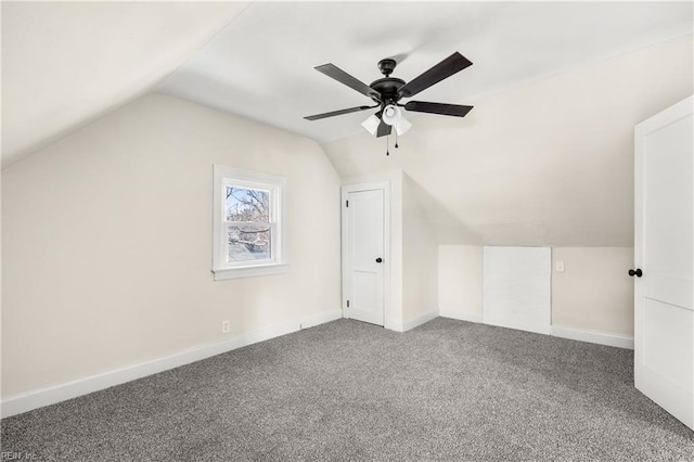 bonus room with ceiling fan, vaulted ceiling, and carpet