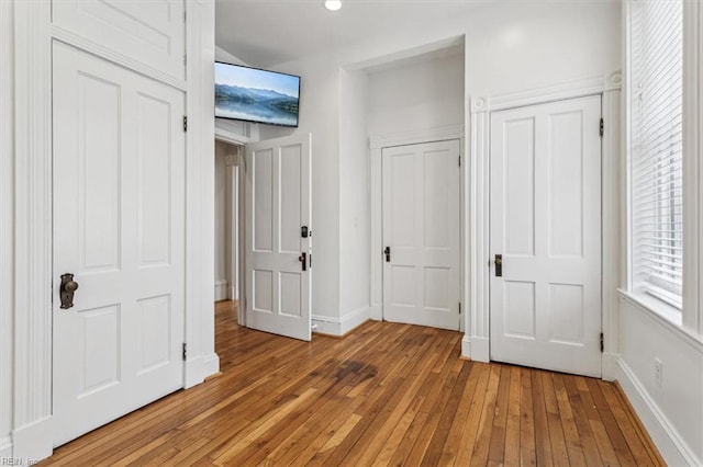 unfurnished bedroom featuring light wood-type flooring