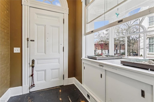 doorway with brick wall