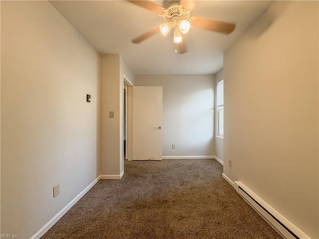 carpeted empty room featuring ceiling fan and a baseboard radiator