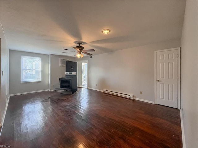 unfurnished living room featuring dark wood-type flooring, a baseboard radiator, ceiling fan, and an AC wall unit