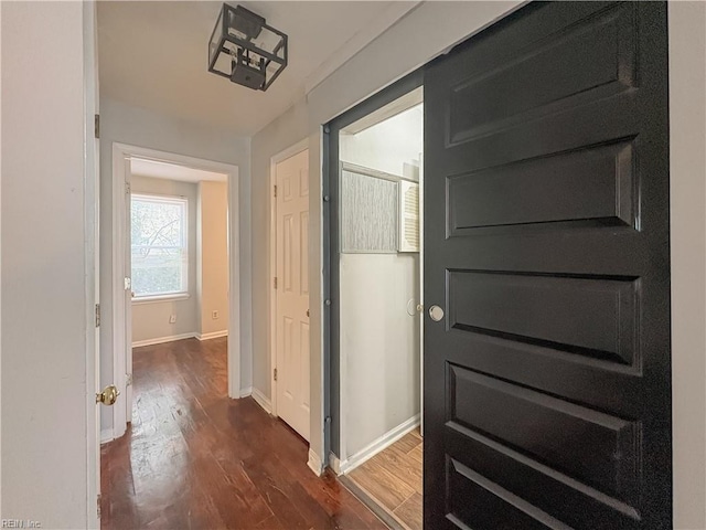 corridor with dark wood-type flooring