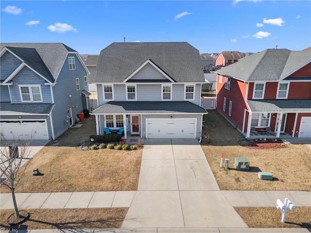 front of property featuring a garage, central AC, and a front yard