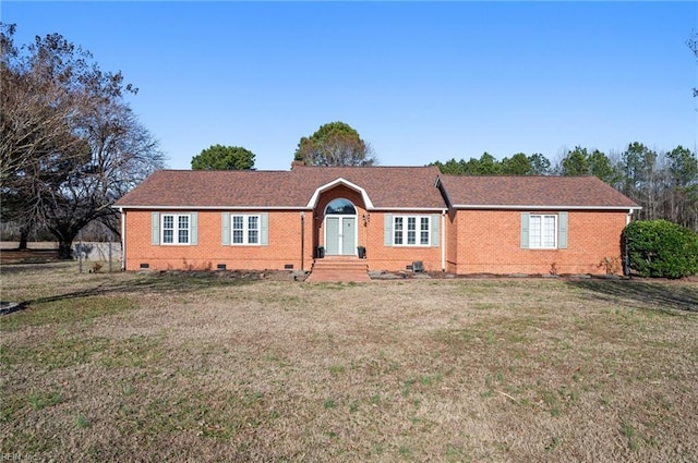 ranch-style house with a front lawn