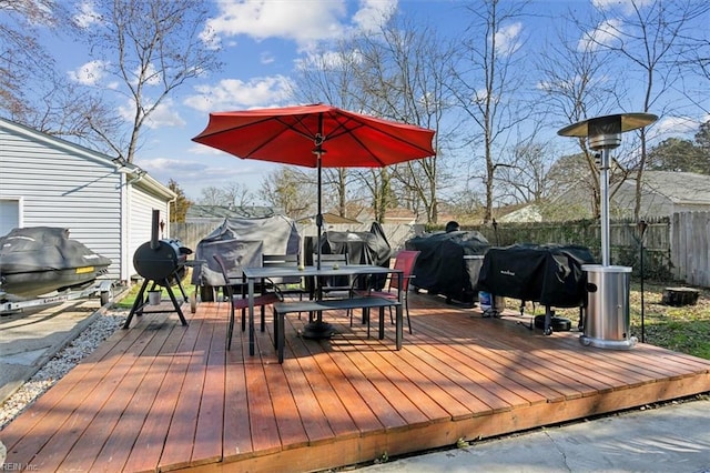 wooden deck featuring grilling area