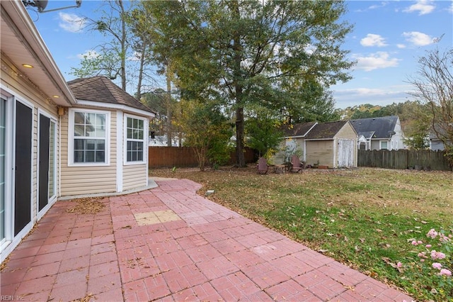 view of patio with a shed