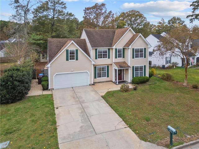 view of front of house featuring a garage and a front lawn