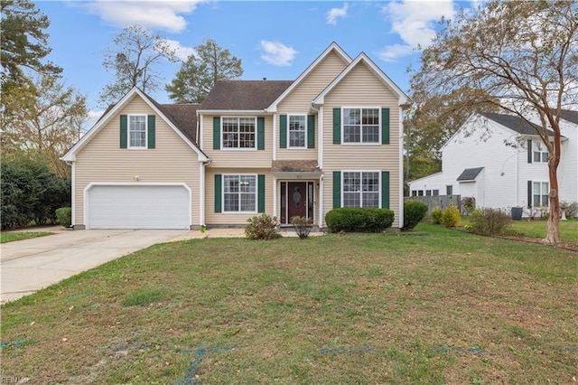 view of front of house featuring a garage and a front yard