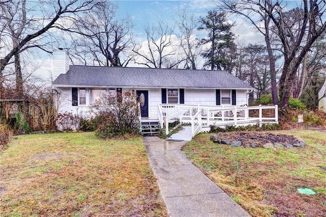 view of front of house with a front yard