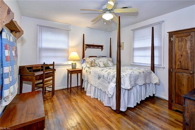 bedroom featuring wood-type flooring and ceiling fan