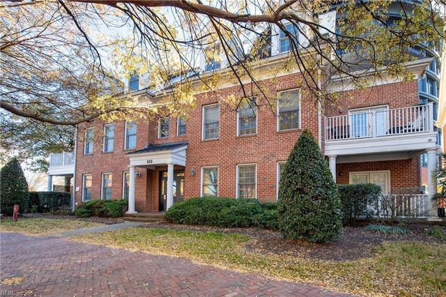 view of property with a balcony