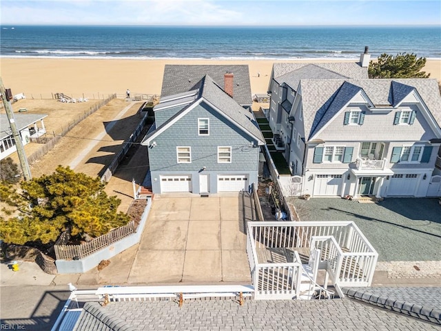 aerial view featuring a beach view and a water view