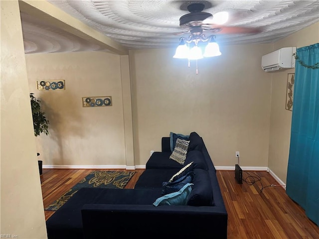 living room featuring hardwood / wood-style floors and a wall mounted AC