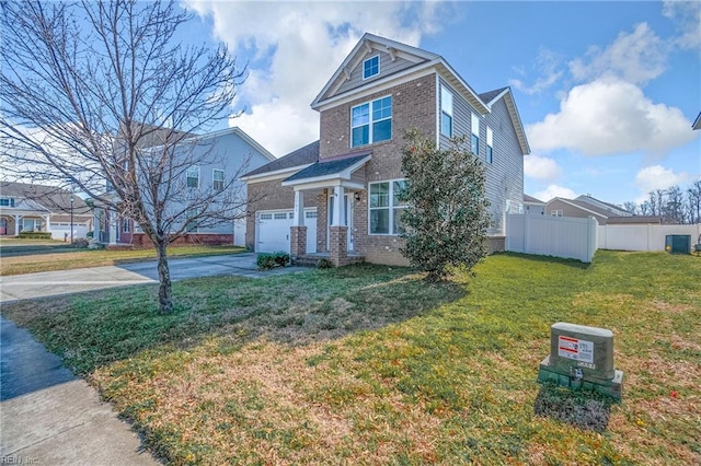 view of front of house with a garage and a front lawn