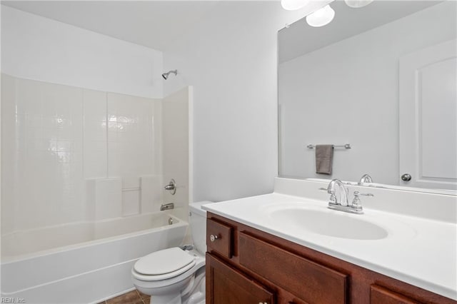 full bathroom with shower / tub combination, vanity, and toilet