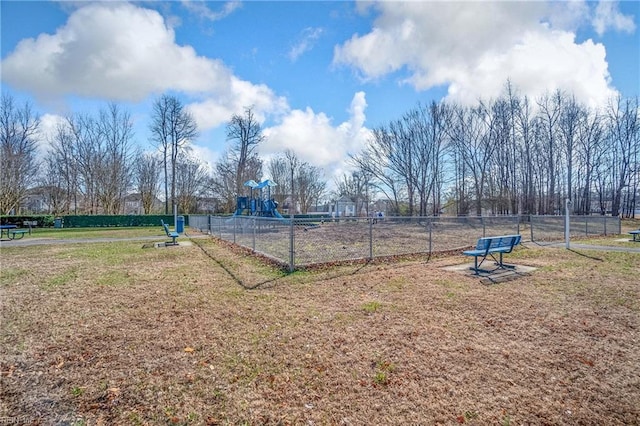 surrounding community with a playground and a lawn