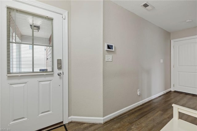 interior space with dark wood-type flooring