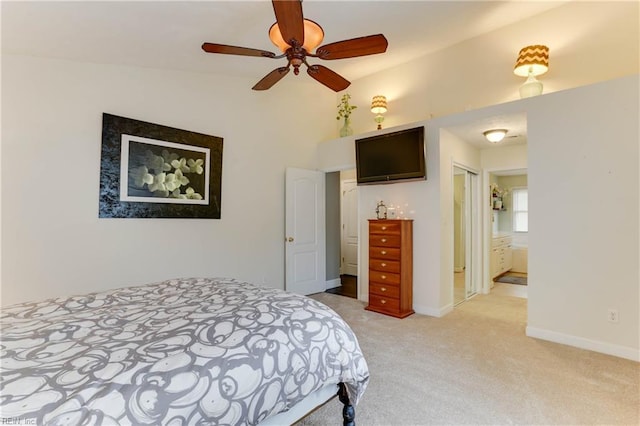 carpeted bedroom with ensuite bath