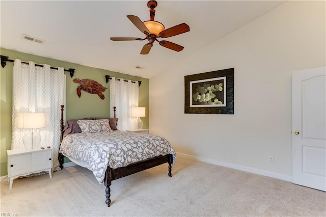 bedroom with vaulted ceiling, carpet, and ceiling fan