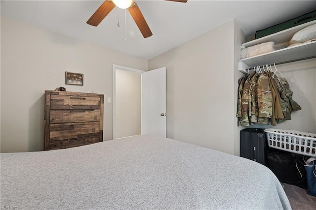 carpeted bedroom featuring ceiling fan