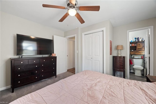 carpeted bedroom featuring connected bathroom, a closet, and ceiling fan