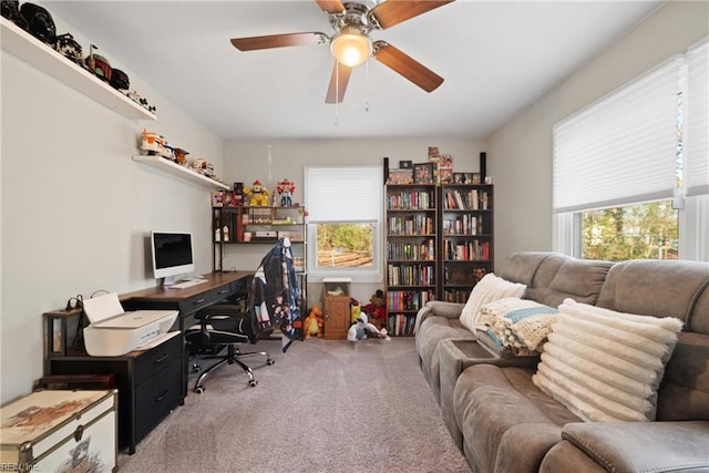 office featuring carpet floors and ceiling fan