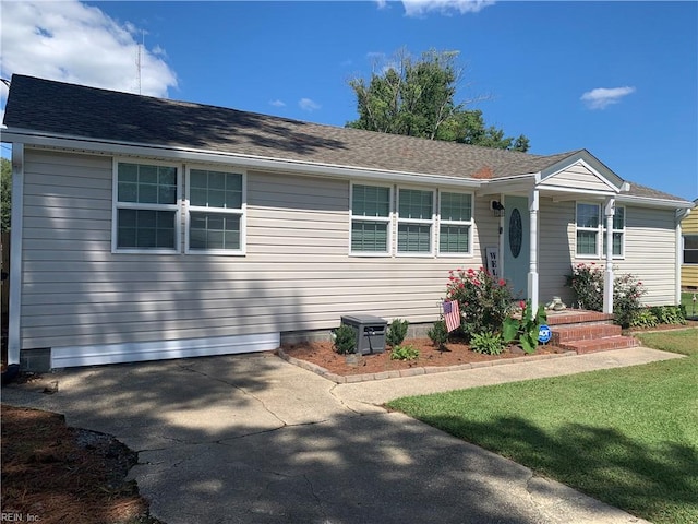 view of front of property with a front lawn