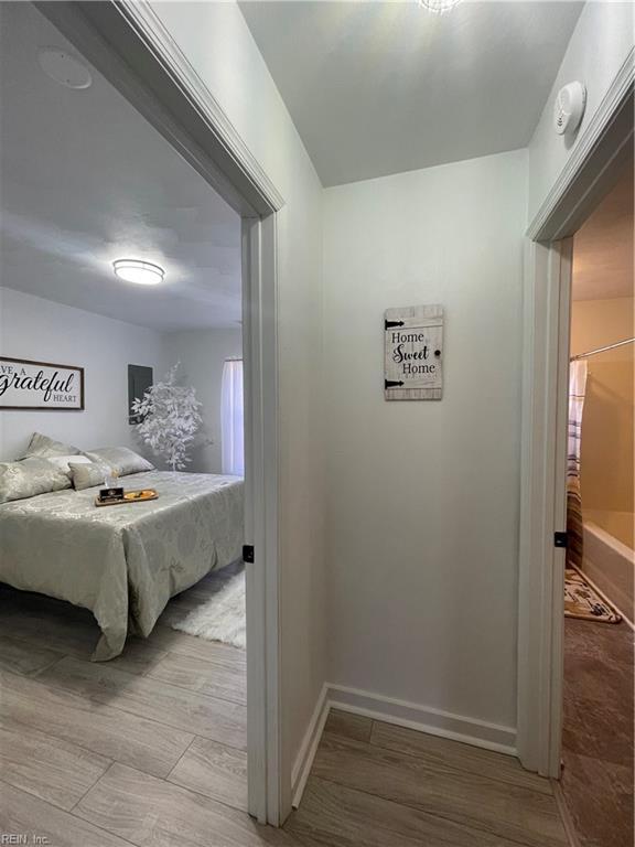 bedroom featuring light wood-type flooring