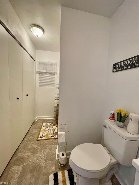 bathroom featuring toilet