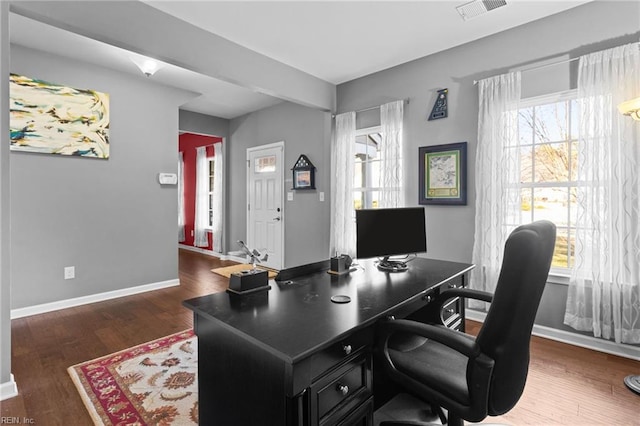 office space featuring dark wood-type flooring