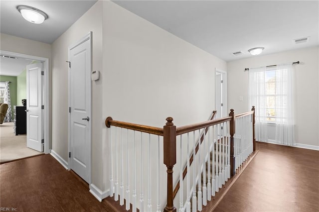 hallway featuring dark wood-type flooring