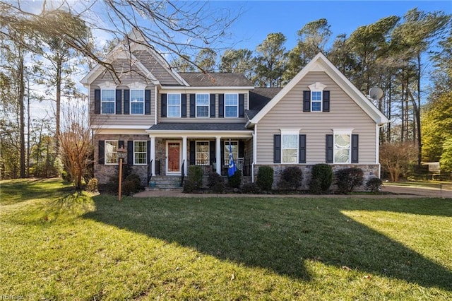 view of front of house featuring a porch and a front yard